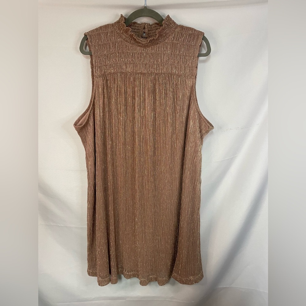 Nine West rose gold shimmery dress with smoking and pleats! This is lined.